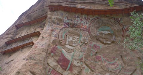 Chinese ancient traditional La Shao temple grotto relief painting in Tianshui Wushan Water Curtain Caves, Gansu China