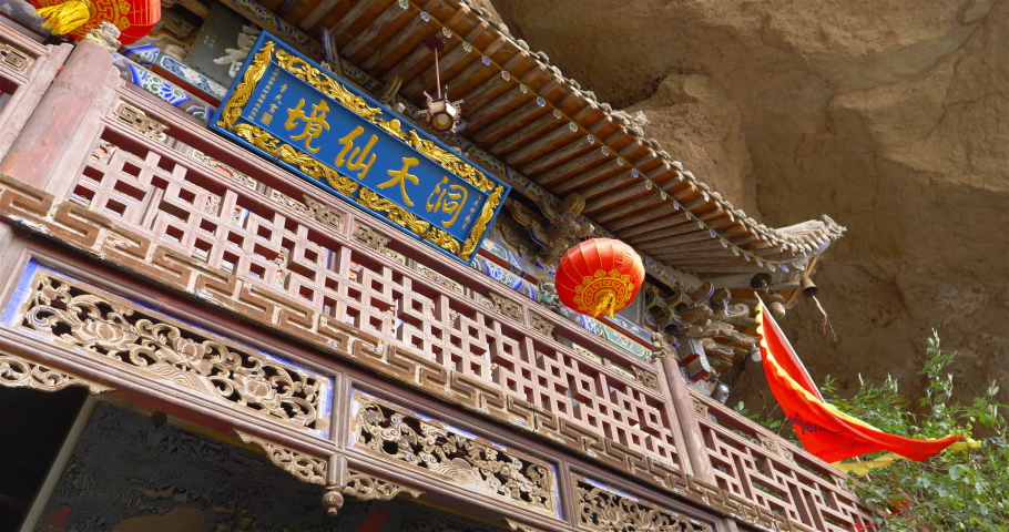 Chinese ancient traditional temple in Tianshui Wushan Water Curtain Caves, Gansu China. Chinese translation : Beautiful spot