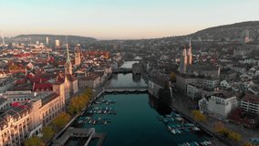 Aerial cityscape flythrough video of Zurich and River Limmat at Sunrise, Switzerland