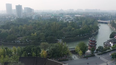 Aerial view of baihuatan park and the Jinjiang river. traditional district in the Qintai road in chengdu, china
