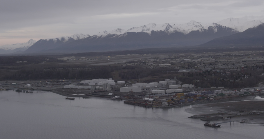 Helicopter aerial shot of port city in Alaska, drone