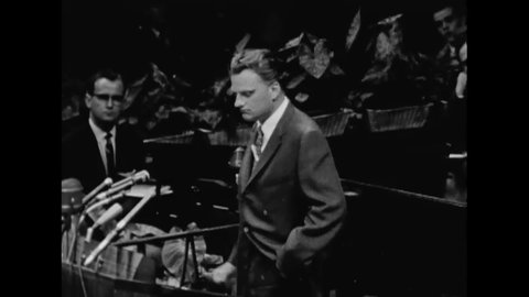 CIRCA 1957 - In his crusade at Madison Square Garden, Billy Graham talks about how America needs to find its way back to God.