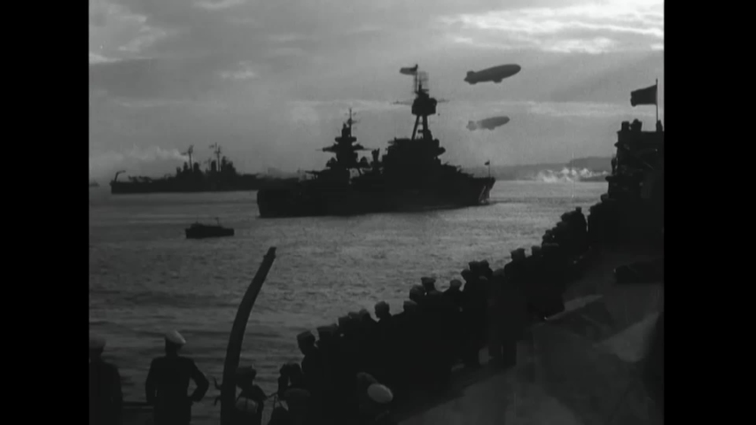 CIRCA 1945 - Airships are seen flying over a US Navy fleet.