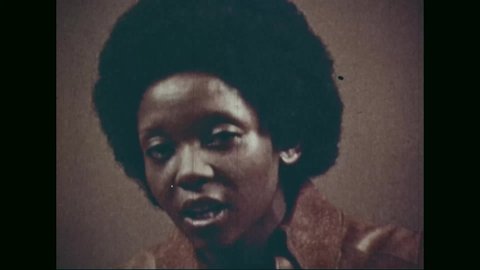 CIRCA 1973 - A woman describes Jomo Kenyatta and the Kenya African Union.