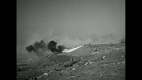 CIRCA 1945 - US Marines use flamethrowers on Iwo Jima.