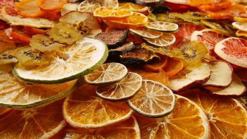 Dried assorted citrus on the table.