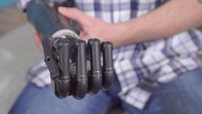 Engagement ring in bionic prosthetic hand - Powered by Shutterstock - Get 15% off with code: PIKWIZARD15