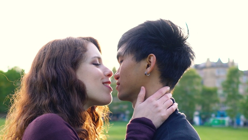 Young Asian Caucasian Couple Kissing Stock Footage Video (100%  Royalty-free) 1040623718 | Shutterstock