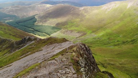Aerial Drone Shot of Hopegill Head Summit with Dramatic Fells and Cliffs. Lake District. UK