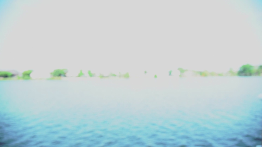 Slow motion of human hand using smartphone to photograph beautiful landscape