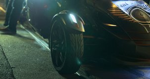 Charcoal Three wheel Motorcycle in the road, with yellow lines, night clip 4k