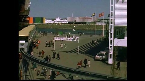 CIRCA 1967 home movies of families and people walking at Expo 67 in Montreal. Very dated looking, 60s fashion sense.
