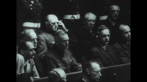 CIRCA 1945 - Rudolf Hess, Ribbentrop, Keitel, Alfred Rosenberg, and Julius Streicher declare they are not guilty at the Nuremberg Trials.
