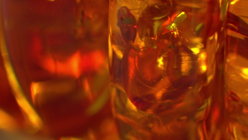 Artificial Amber stones. Macro with dynamic Royalty-Free Stock Footage #1040677853