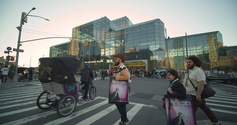 New York, New York / United States- October 4 2019: Crowd outside the Jacob Javits Center for Comic Con. Fans arriving at Jacob Javits  Center. Wide