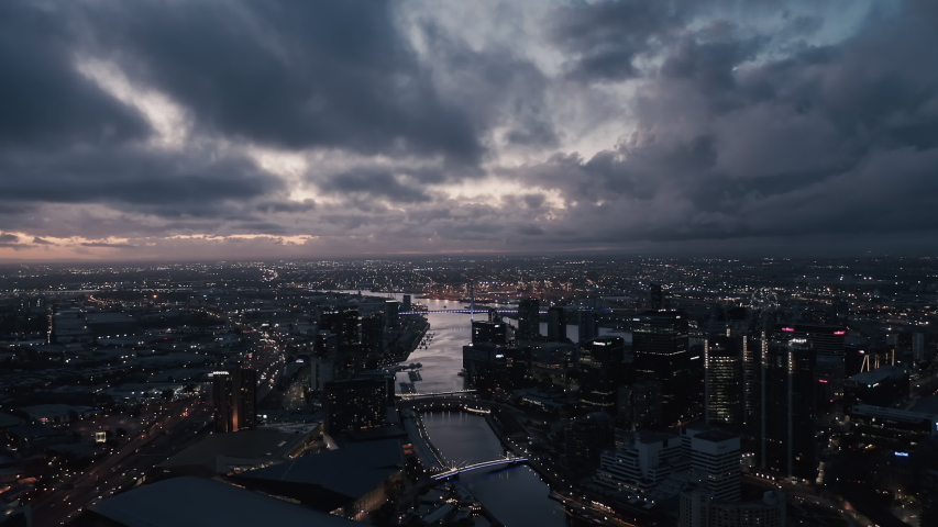 Aerial sunset video of CBD Melbourne at Yarra River, Australia