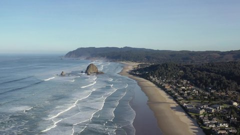 Cannon Beach on Oregon coast with view of Haystack Rock. Aerial 4K drone footage. 
