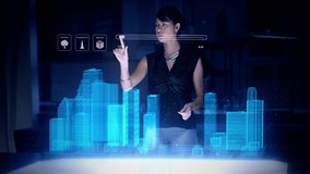 Female Architect works with Holographic Augmented Reality 3D City Model using gestures showing graphs. Technologically Advanced Office with Augmented Virtual Modeling Software on Futuristic Display. - Powered by Shutterstock - Get 15% off with code: PIKWIZARD15
