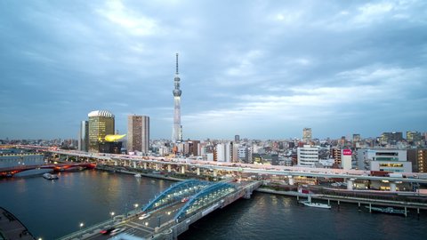 TOKYO, JAPAN - APRIL 2019: Beautiful aerial timelapse of Tokyo city skyline with Tokyo Skytree at late evening, Japan.