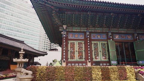 Seoul / South Korea - 02 21 2019: Jogyesa Temple and Tree Pan Right Reveal