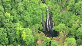 Banyumala Twin Waterfalls. Bali Island, Indonesia. Video shooting from the air.