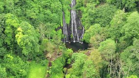 Banyumala Twin Waterfalls. Bali Island, Indonesia. Video shooting from the air.