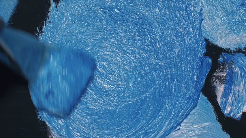 Artist copyist paint seascape with ship in ocean. Craftsman decorator draw as boat sail on blue sea with acrylic oil color. Draw finger, brush, knife palette. Indoor. Close up cinematic look.