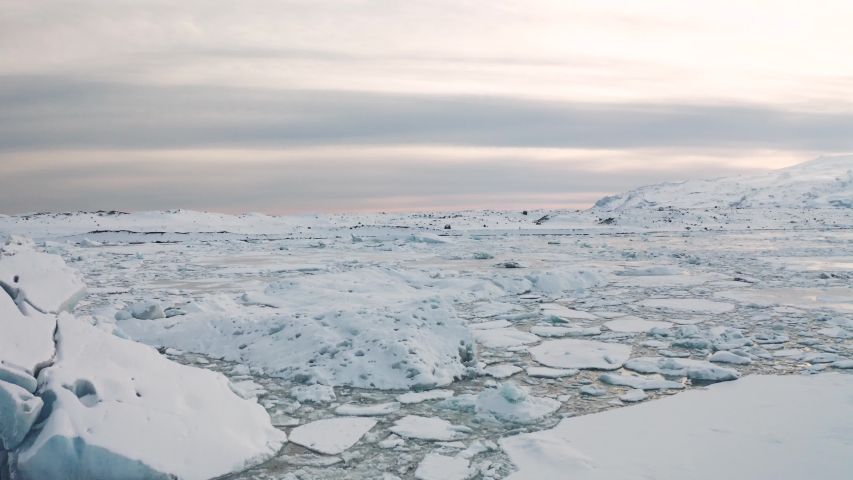 Aerial view of the J kuls rl n glacial lagoon and floating icebergs. The beginning of spring in Iceland