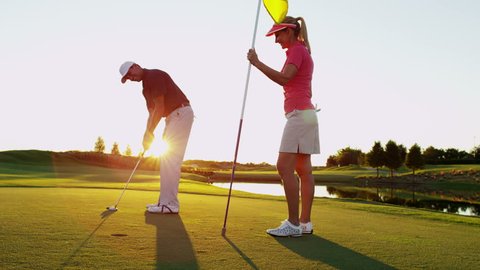 Lifestyle Golf Player Caucasian Couple Putt Target Green Club Florida Vacation