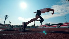 Slow motion of a paralympian jogging at the stadium - Powered by Shutterstock - Get 15% off with code: PIKWIZARD15