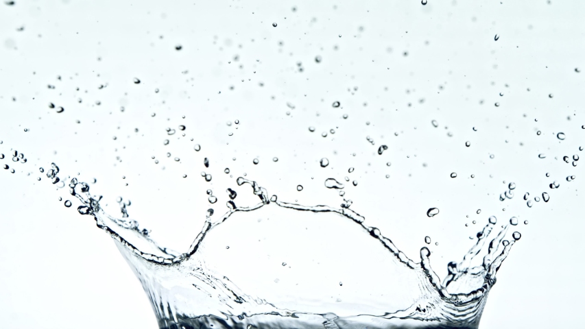 Super Slow Motion Shot of Water Splash at 1000fps on White Background. | Shutterstock HD Video #1040808527