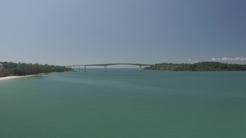Bridge over the sea, asphalt road blue water Drone shot in Cambodia