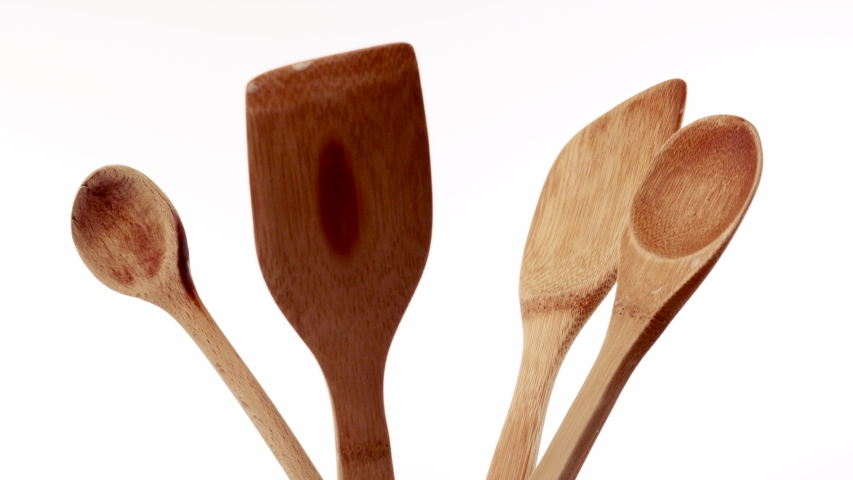 set of wooden kitchen spoons rotating