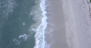 Drone video of waves hitting the beach on the Indian Ocean on the Swahili coast, Tanzania.
