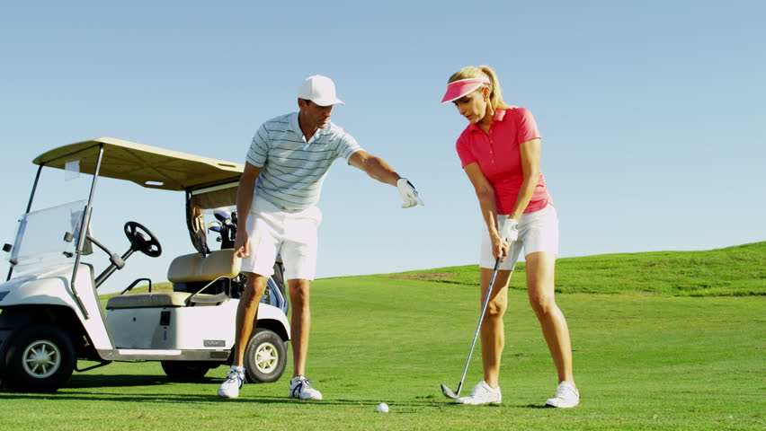 Healthy Outdoor Sport Caucasian Female Golf Player Male Coach Activity Training Royalty-Free Stock Footage #10408445