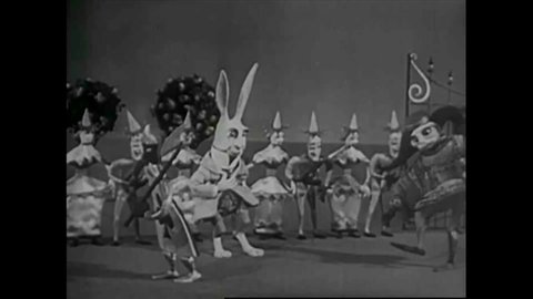 CIRCA 1950s - Scenes from a 1950s era stop motion and live action film of Alice and Wonderland.