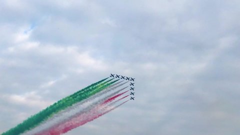 Milano, Italy - October 13 2019: Frecce Tricolori (Tricolour Arrows)Italian acrobatic aircraft team during exhibition over Milan. Airshow performance.