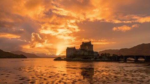 This is a timelapse of the Scottish Highlands on a cloudy day in fall near Eilean Donan Castle with a breathtaking sunset. 