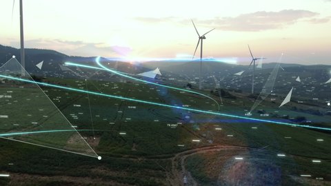 Futuristic Technology Concept. Scientist with Tablet Sending Data to Global Digital Network over Ecology Safe Alternative Energy Source. Visualization Flowing Information. Aerial shot of wind turbines