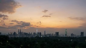 4K time lapse of gloomy sunrise over downtown Kuala Lumpur, Malaysia.