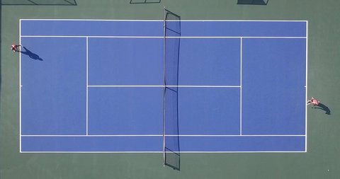 Tennis match - Top down aerial view.