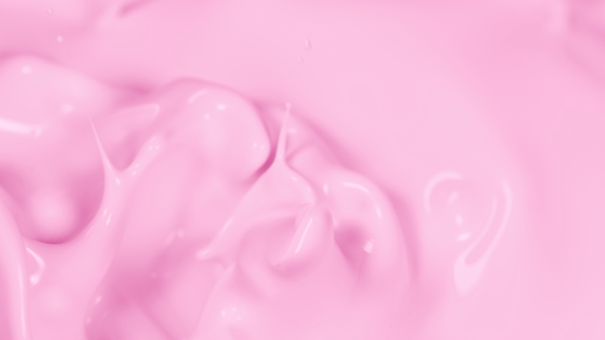 Super Slow Motion Shot of Pouring and Splashing Strawberry Milk at 1000fps. | Shutterstock HD Video #1040917307
