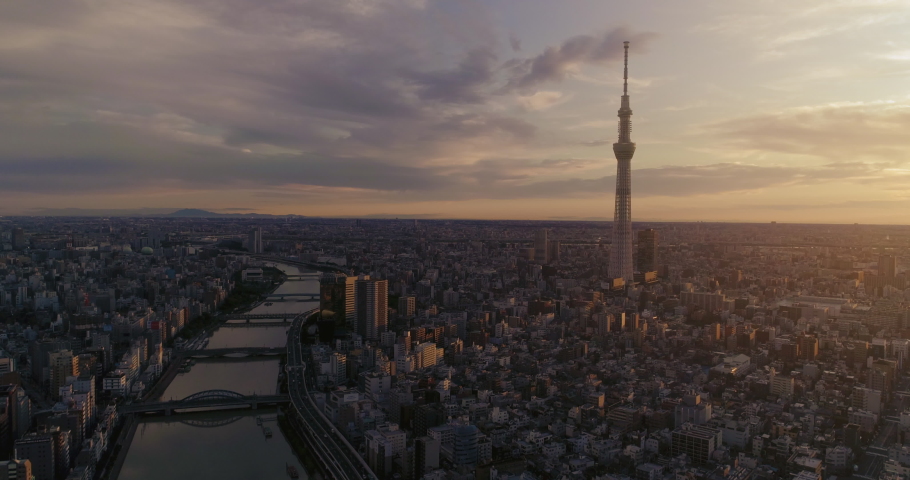 Aerial shot of Skytree and Tokyo cityscape at dawn, Japan Royalty-Free Stock Footage #1040928749
