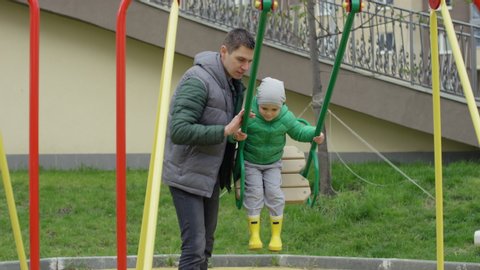 Parents Pushing Child On Swing Stock Video Footage 4k And Hd Video Clips Shutterstock