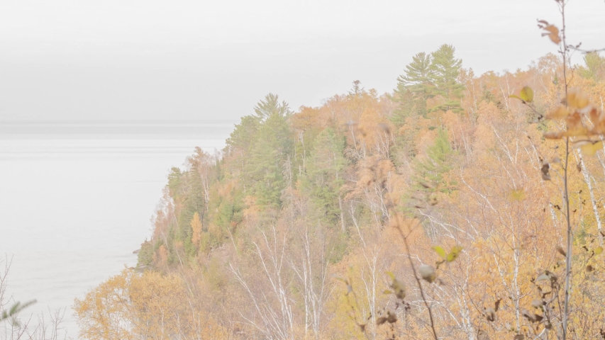 A Pink and Blue Sunset Sky over a Northern Wisconsin Bluff Overlooking Lake Superior during Autumn 4K UHD Timelapse