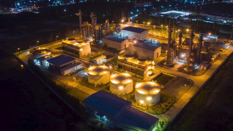 Hyperlapse Timelapse Aerial view drone of oil refinery terminal is industrial facility for storage of oil and petrochemical. oil manufacturing products. power electric plant. footage b roll time lapse