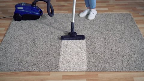 vacuum cleaner close up cleaning dirty carpet