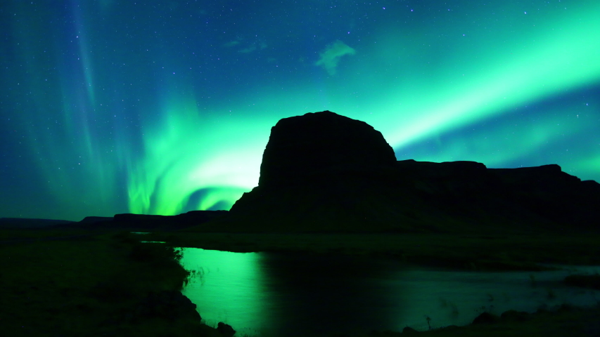 Northern lights (Aurora Borealis) in Iceland. 4K UHD video of amazing northern lights on Iceland. | Shutterstock HD Video #1041013694