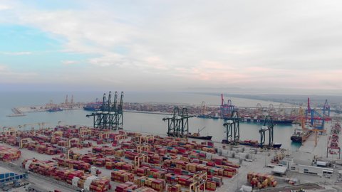 4K Drone Footage of shipyard full of ships in Valencia