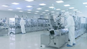 Manufacturing Facility Workers Assembling Products Using Industrial High Precision Machinery. Special Effects Animation: Wi-Fi Connected Icons with Completion Progress. Industry 4.0 Concept of IOT - Powered by Shutterstock - Get 15% off with code: PIKWIZARD15